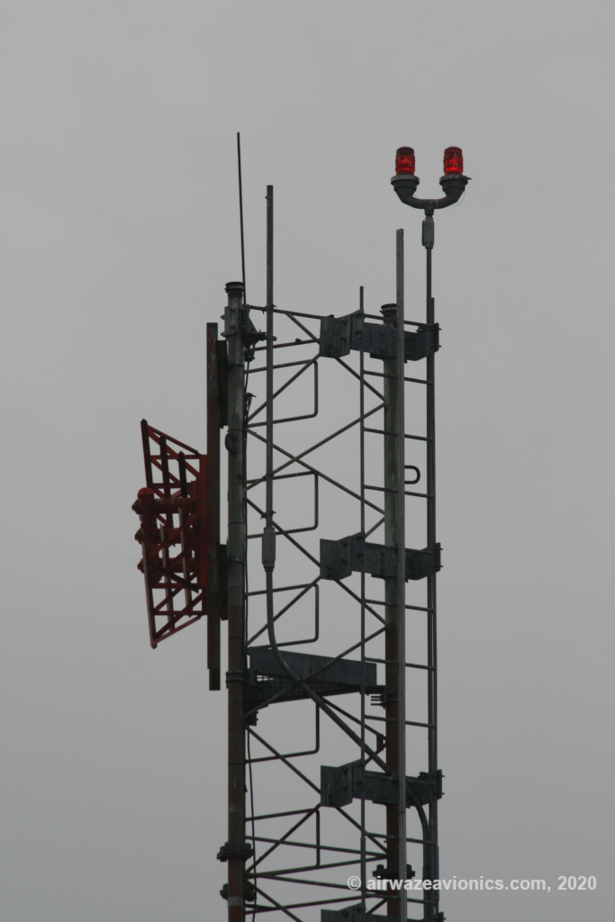 Image of glideslope antenna element mounted on a tower.